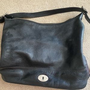 Gently used black fossil bag